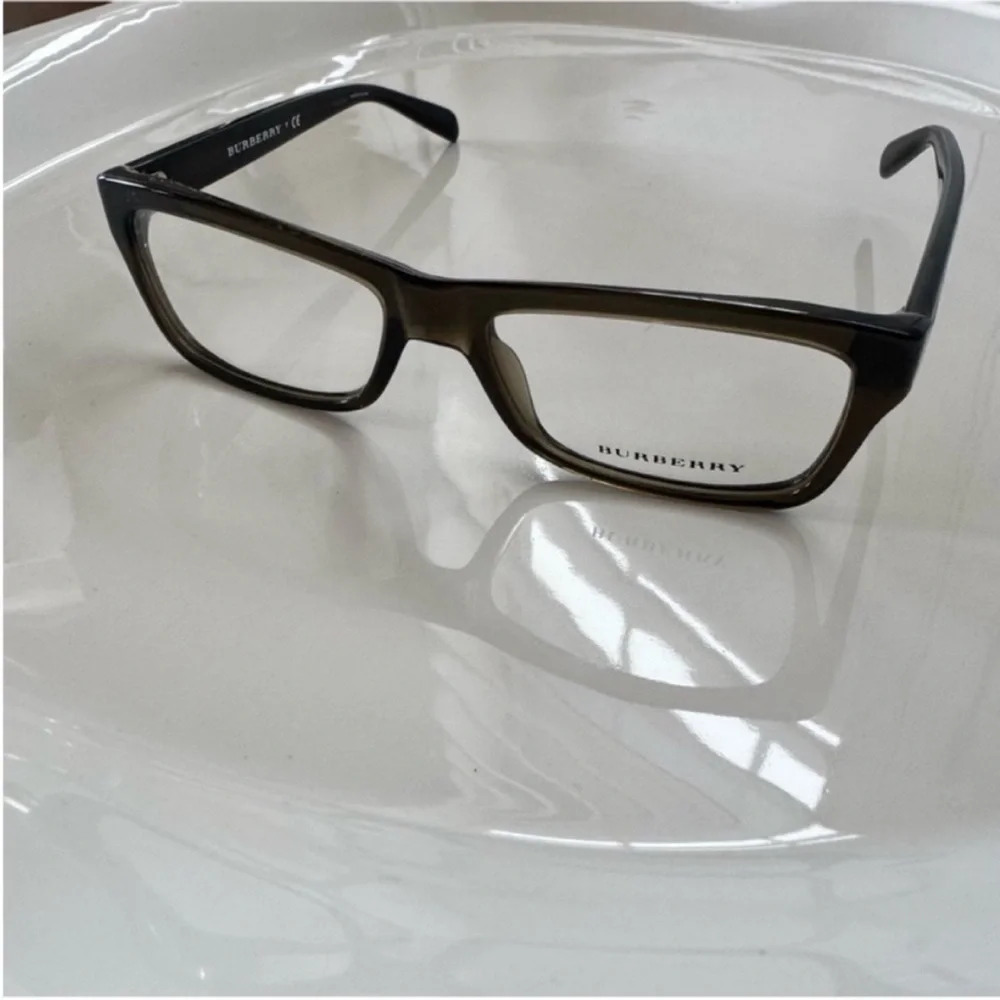 Burberry Elegant Black and Brown Glasses